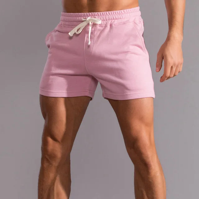 Men's casual shorts with pockets, tailored fit, breathable fabric, light color, ideal for summer outdoor activities.