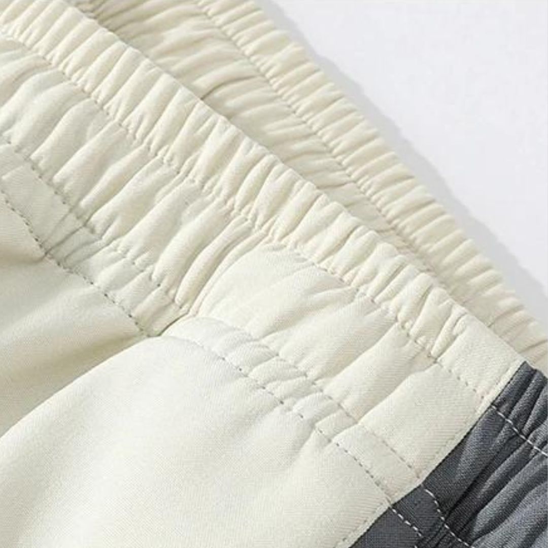 "Men's casual sports tracksuit with stylish stripe design, lightweight jacket and jogger pants, perfect for active or casual