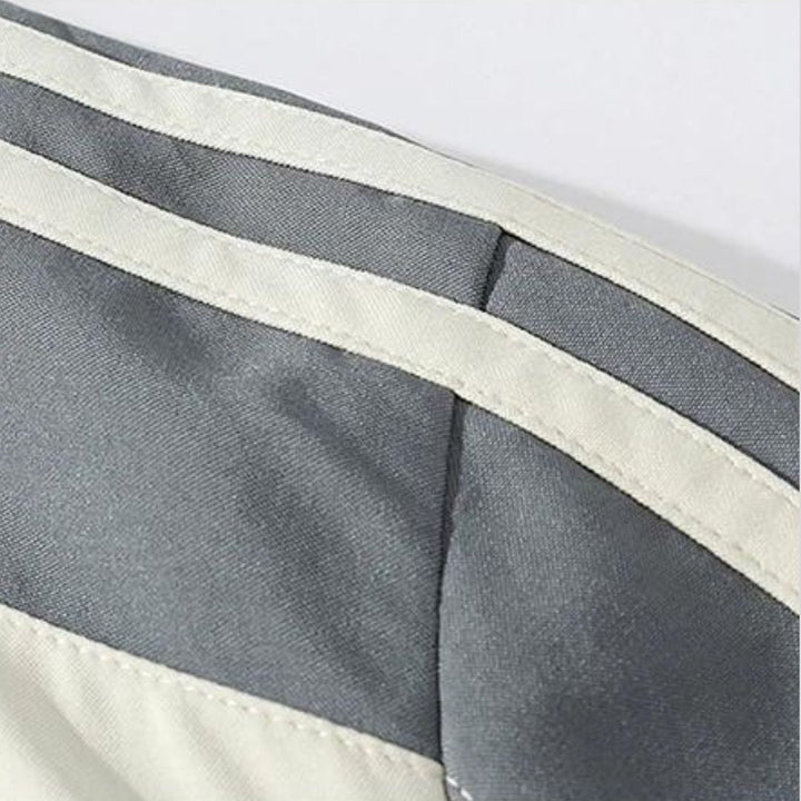 "Men's casual sports tracksuit with stylish stripe design, lightweight jacket and jogger pants, perfect for active or casual