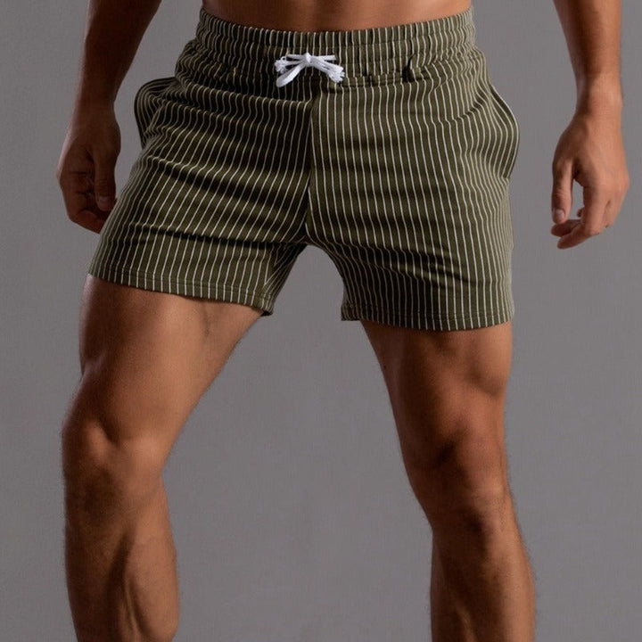 Men's casual striped shorts, featuring chic stripes, elastic waistband, breathable fabric, ideal for relaxed outings.