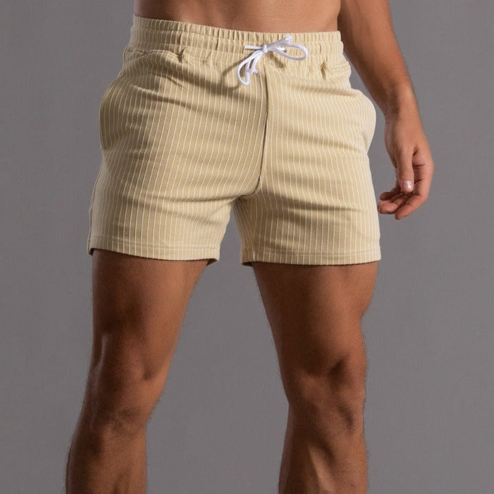 Men's casual striped shorts, featuring chic stripes, elastic waistband, breathable fabric, ideal for relaxed outings.