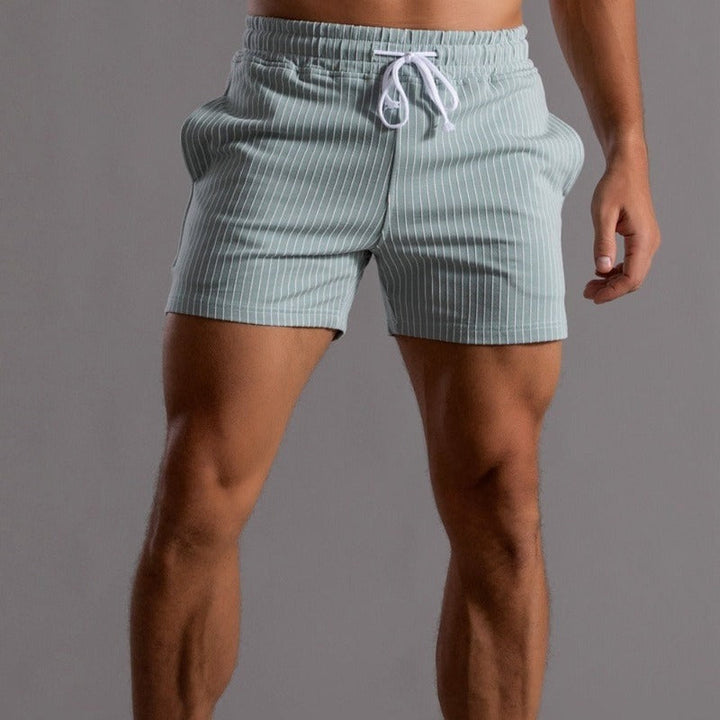 Men's casual striped shorts, featuring chic stripes, elastic waistband, breathable fabric, ideal for relaxed outings.