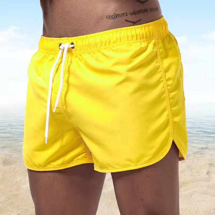 Men's casual swim shorts with adjustable waistband, relaxed fit, and versatile style, perfect for beach and pool days.