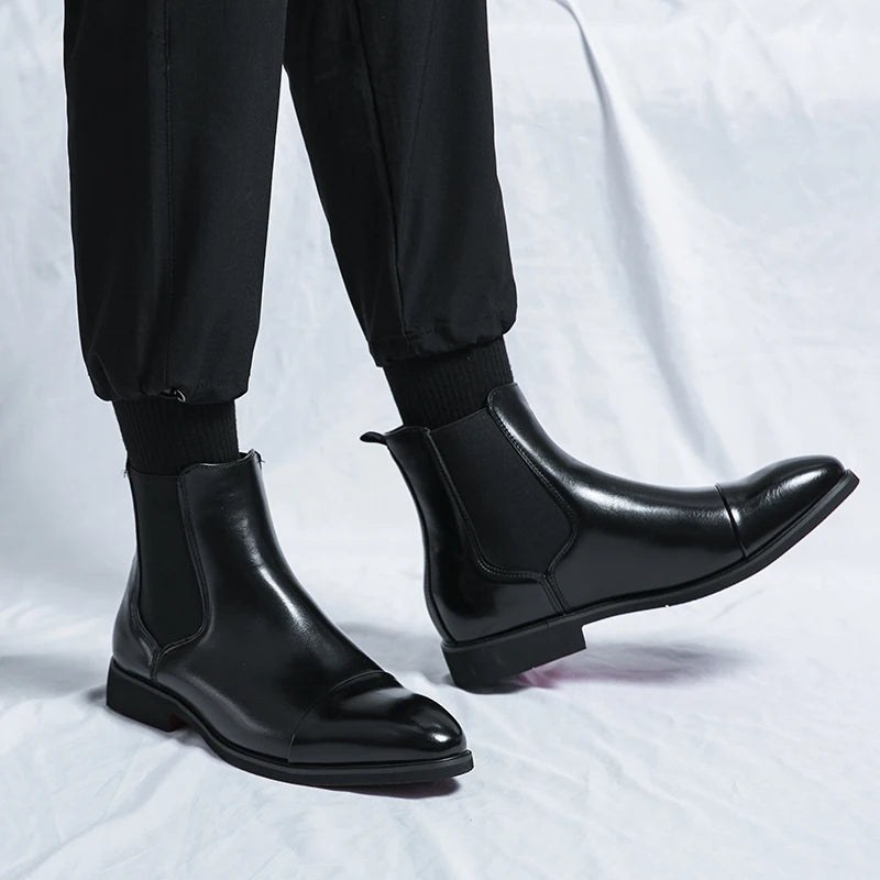 "Men's Chelsea leather boots, slip-on cap toe, ankle style, rich leather finish, versatile smart-casual footwear."