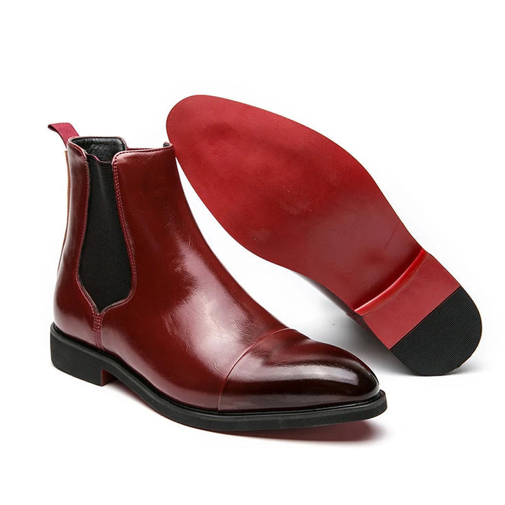 "Men's Chelsea leather boots, slip-on cap toe, ankle style, rich leather finish, versatile smart-casual footwear."