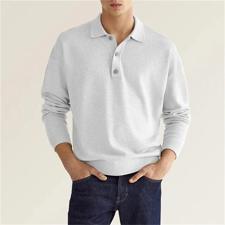 Men's classic long-sleeve polo shirt in grey with a polished collar, showcasing modern comfort and trendy fashion.