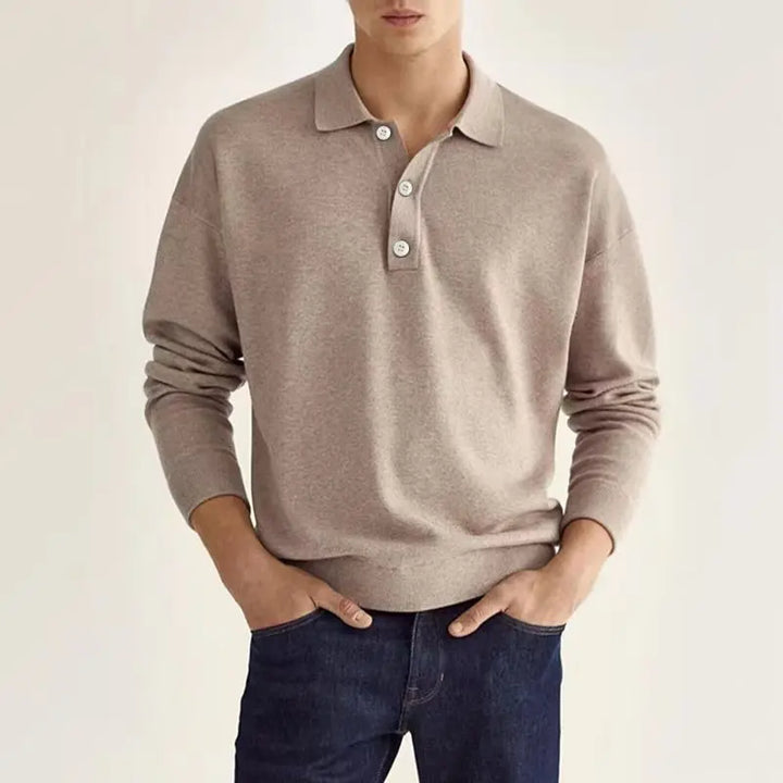 Men's classic long-sleeve polo shirt in grey with a polished collar, showcasing modern comfort and trendy fashion.
