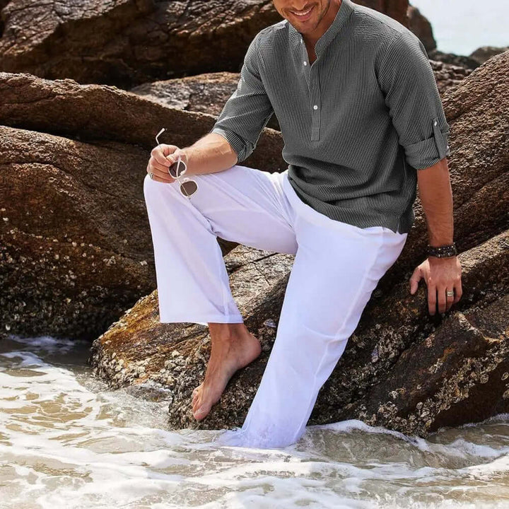 "Men's classic stand collar shirt in organic linen blend, solid color, elegant, airy, refined casual summer style."
