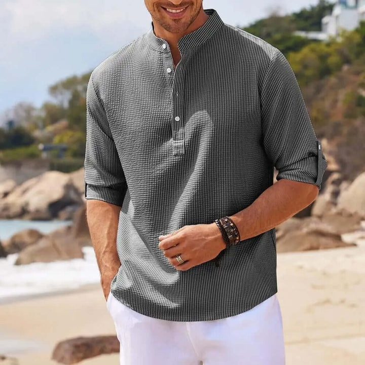 "Men's classic stand collar shirt in organic linen blend, solid color, elegant, airy, refined casual summer style."