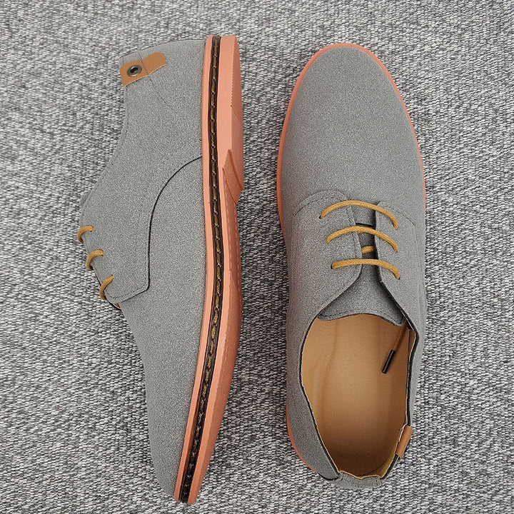"Men's classic suede Oxford shoes, elegant design for versatility, perfect for formal and casual occasions."