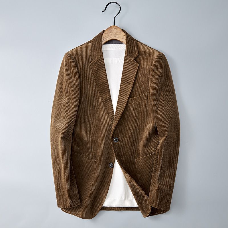 Men’s corduroy jacket with notched lapel; smart casual blazer featuring durable fabric in classic single-breasted style.