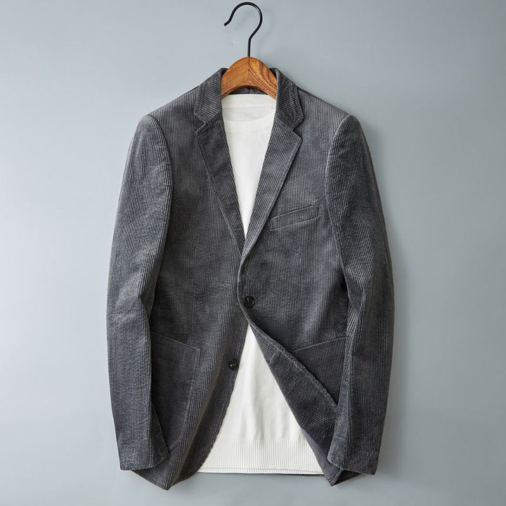 Men’s corduroy jacket with notched lapel; smart casual blazer featuring durable fabric in classic single-breasted style.