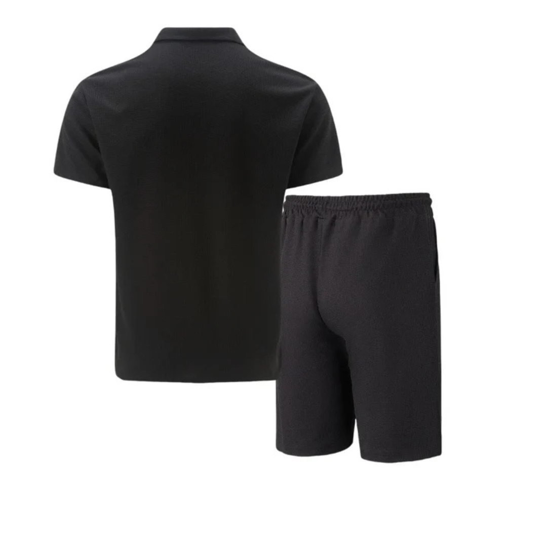 "Men's cotton co-ord set with a short-sleeved zip-neck polo and drawstring shorts, perfect for casual summer style."