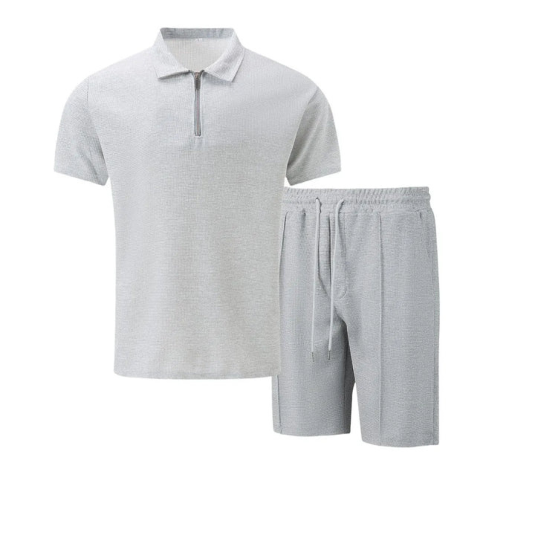 "Men's cotton co-ord set with a short-sleeved zip-neck polo and drawstring shorts, perfect for casual summer style."