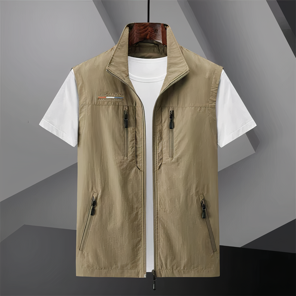 Men's cotton utility vest with multi-pockets, shown in black; ideal for outdoor activities like hiking and fishing.