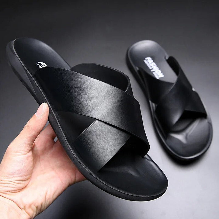 "Men's cross strap anti-slip sandals with grip sole, sleek design, and supportive fit for everyday comfort and safety."