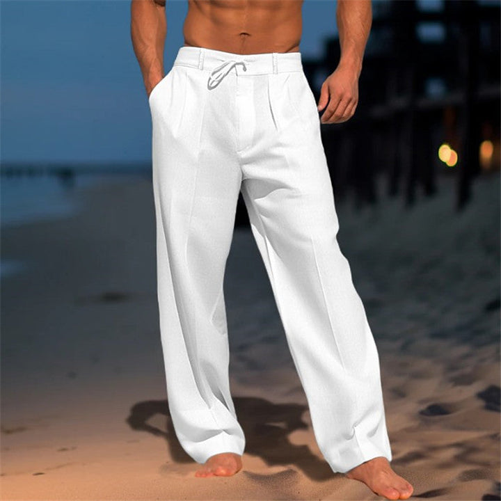 Men's full-length linen trousers with drawstring waist, relaxed fit, and pleated front, ideal for casual wear in warm weather