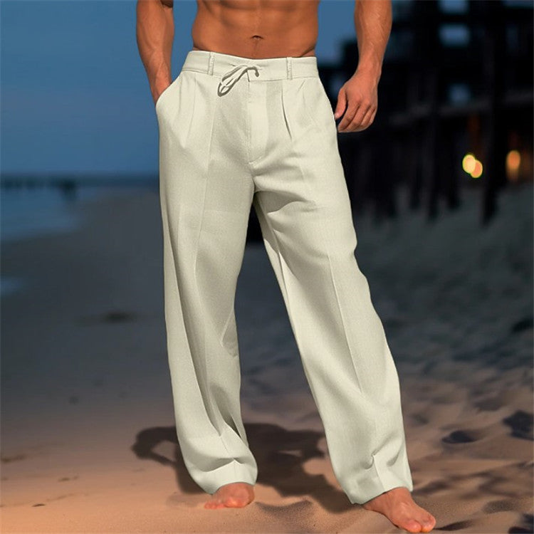 Men's full-length linen trousers with drawstring waist, relaxed fit, and pleated front, ideal for casual wear in warm weather