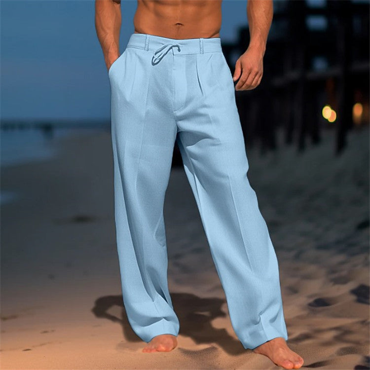 Men's full-length linen trousers with drawstring waist, relaxed fit, and pleated front, ideal for casual wear in warm weather