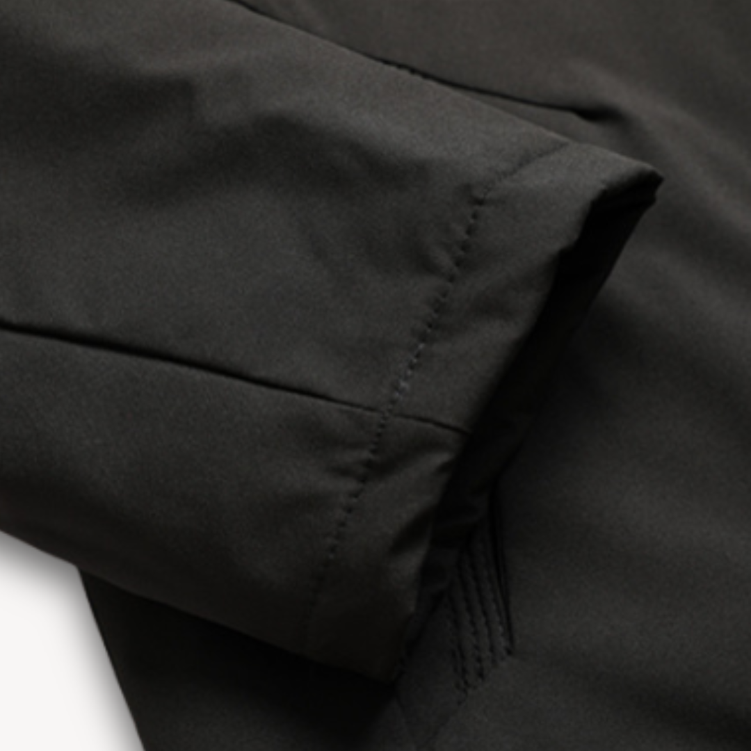 "Men's green waterproof hooded jacket for stylish and durable outerwear. Features sleek design and multi-pocket functionality