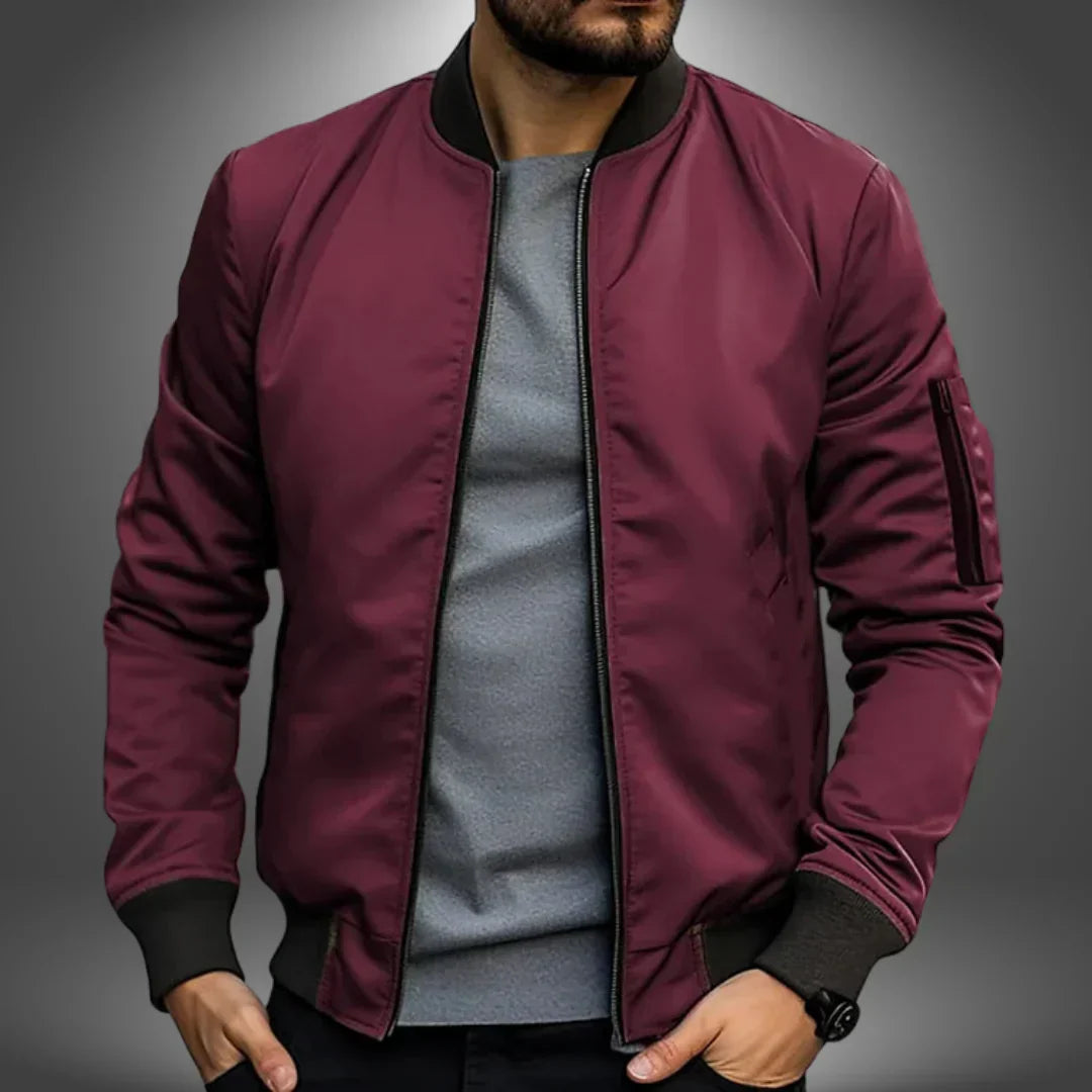 "Men's lightweight bomber jacket, casual windbreaker style with slim fit, features ribbed cuffs and arm zip pocket."