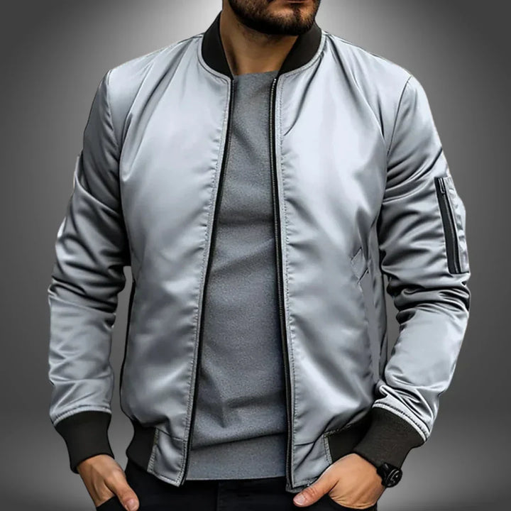 "Men's lightweight bomber jacket, casual windbreaker style with slim fit, features ribbed cuffs and arm zip pocket."