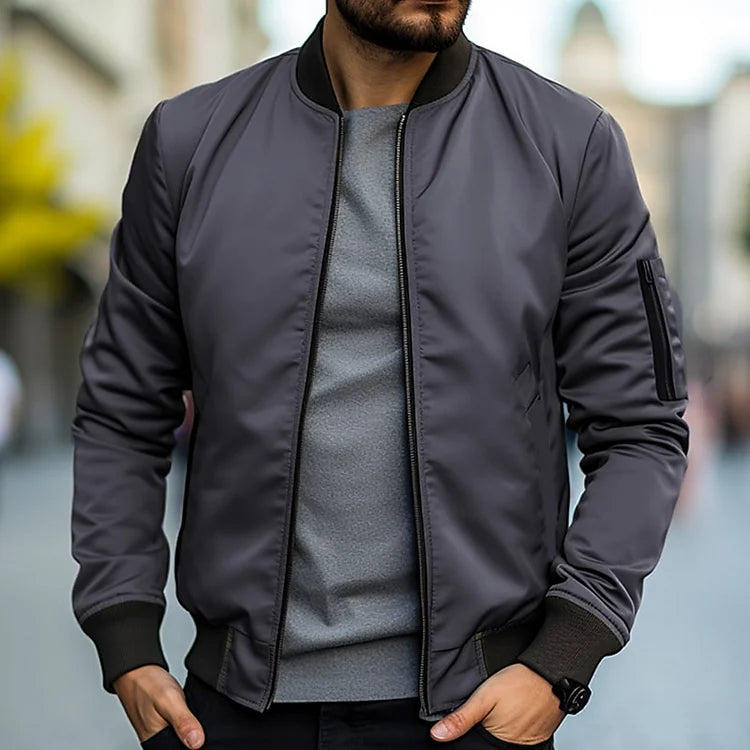 Men's lightweight bomber jacket with ribbed trim, regular fit, sleek design, versatile casual style, and breathable fabric.