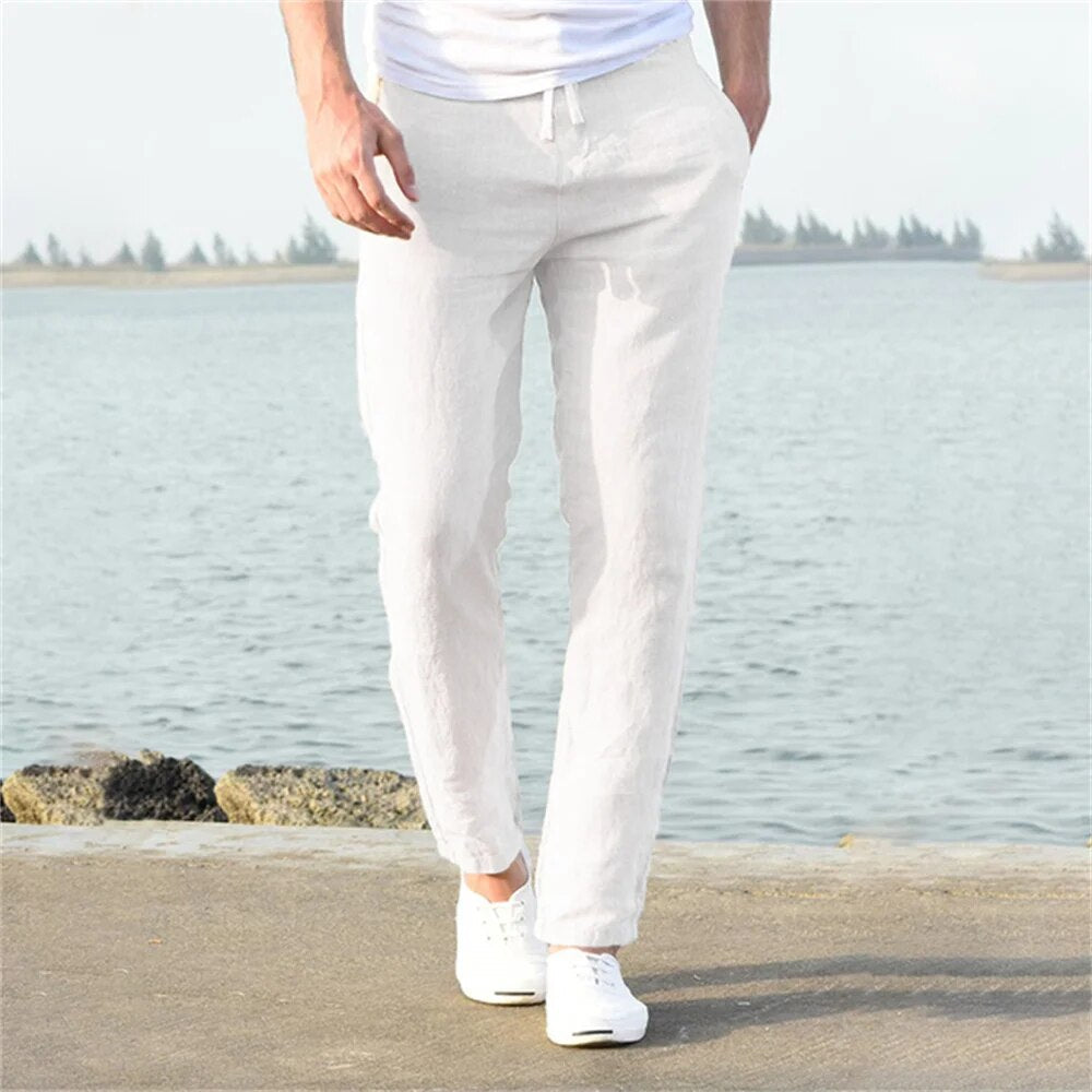 Men's lightweight linen trousers, casual and versatile, in light blue, showcasing a modern, relaxed fit and breathable fabric