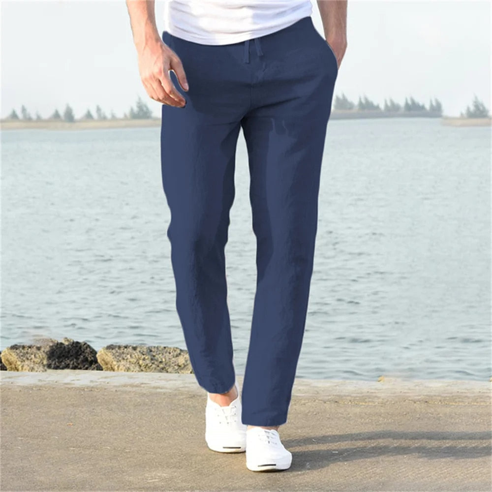 Men's lightweight linen trousers, casual and versatile, in light blue, showcasing a modern, relaxed fit and breathable fabric