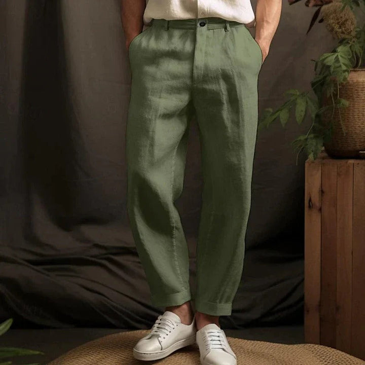 "Men's lightweight linen trousers in light beige, showcasing a relaxed fit for summer comfort and versatile style."