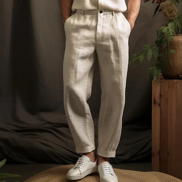 "Men's lightweight linen trousers in light beige, showcasing a relaxed fit for summer comfort and versatile style."