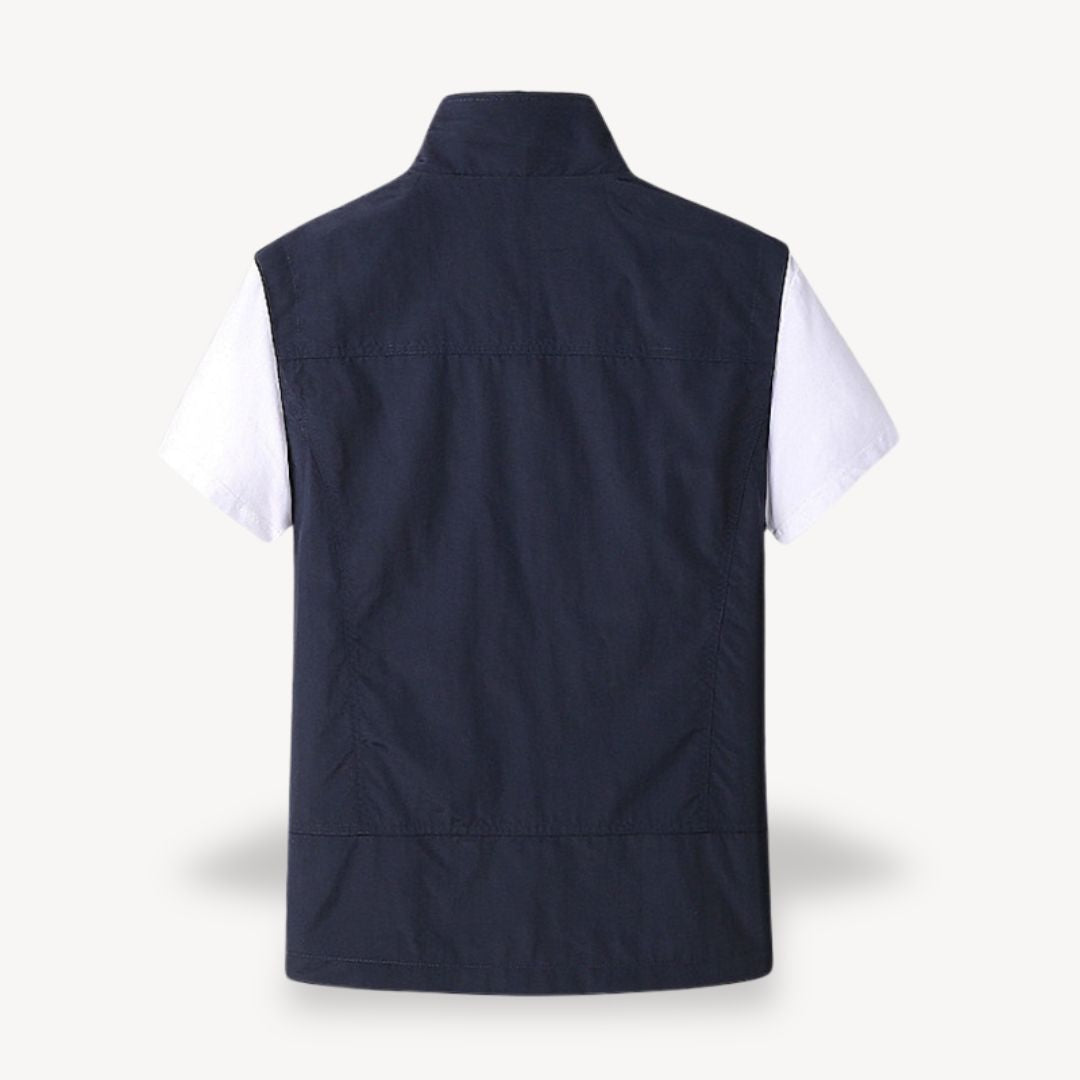 Men's lightweight quilted vest, stylish layering in navy blue, full zip, insulated yet non-bulky, perfect for cooler seasons.