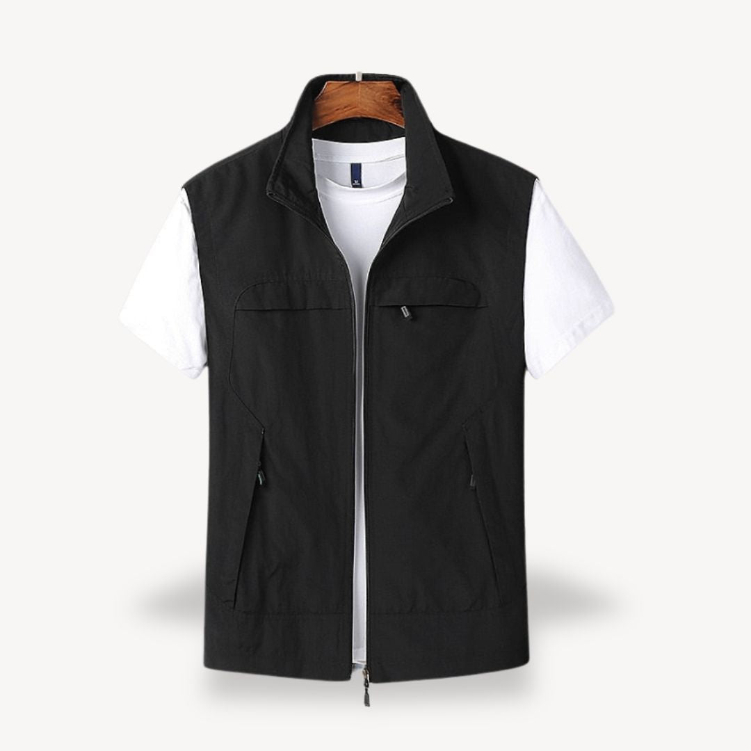 Men's lightweight quilted vest, stylish layering in navy blue, full zip, insulated yet non-bulky, perfect for cooler seasons.