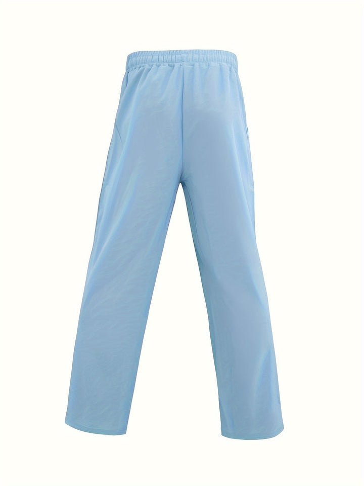 "Men's lightweight relaxed fit lounge trousers with drawstring waist, breathable fabric, shown in stylish grey tone."