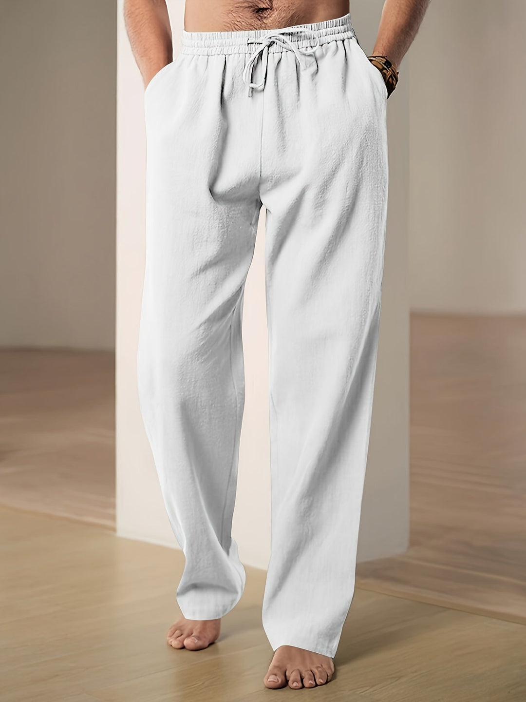 "Men's lightweight relaxed fit lounge trousers with drawstring waist, breathable fabric, shown in stylish grey tone."