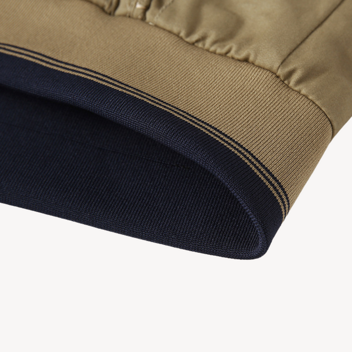 "Men's lightweight reversible bomber jacket, slim fit, available in multiple colors, showcasing ribbed cuffs and zip closure.