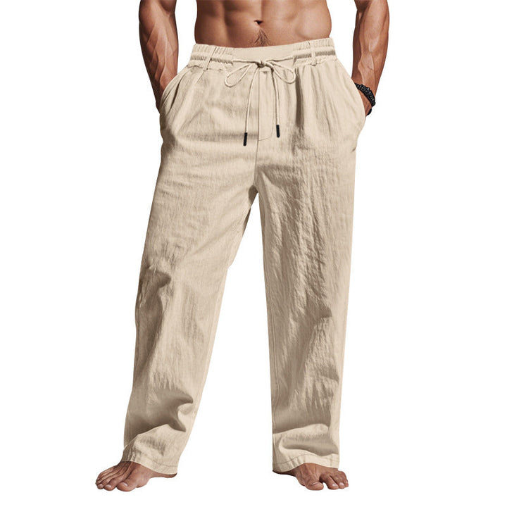 "Men's linen trousers with drawstring waist, relaxed fit, lightweight breathable fabric, ideal for casual and sunny days."