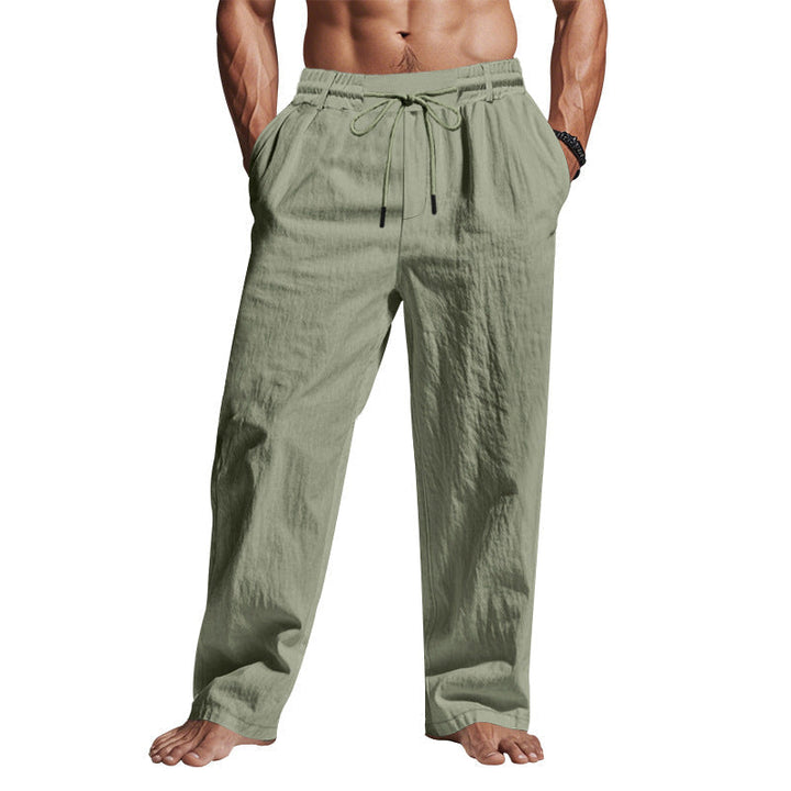 "Men's linen trousers with drawstring waist, relaxed fit, lightweight breathable fabric, ideal for casual and sunny days."