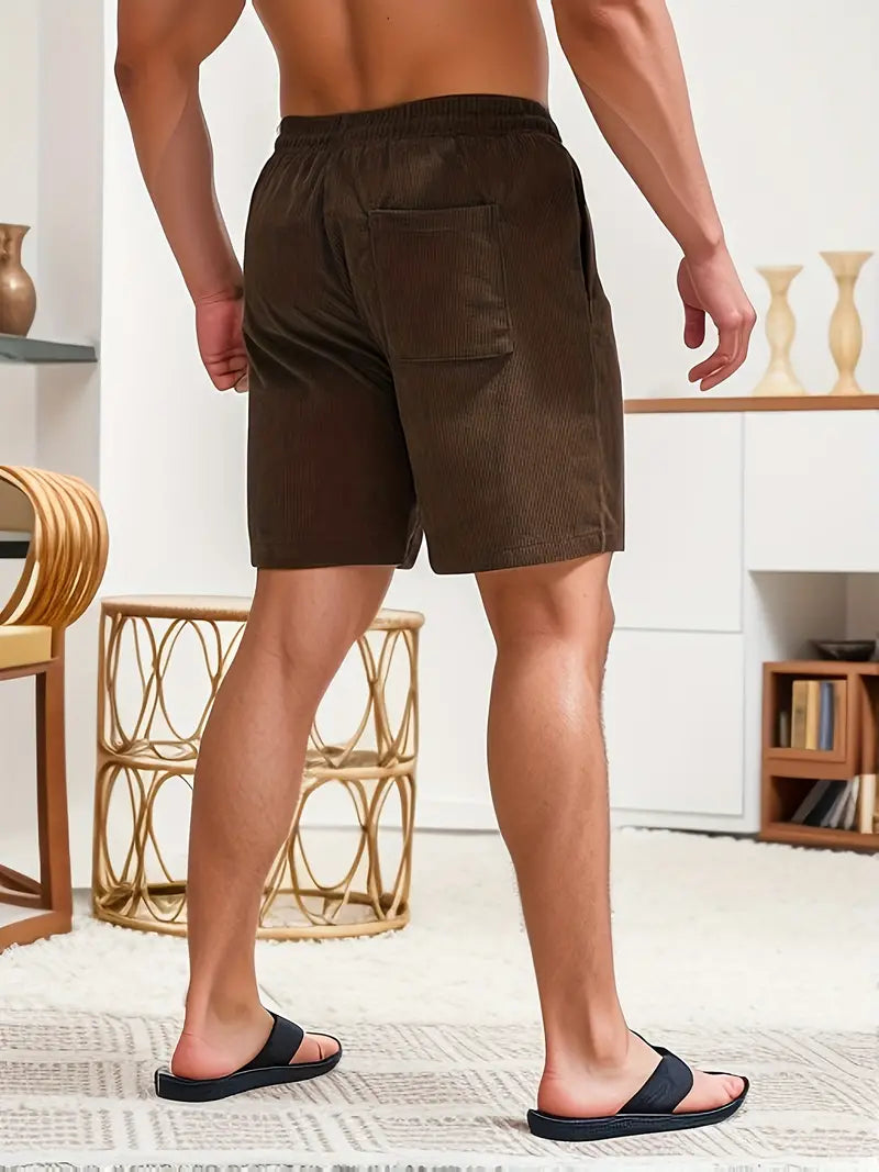 "Men's loose-fit corduroy shorts with drawstring waist in various colors, soft texture, relaxed fit for casual wear."