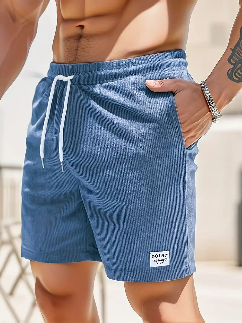 "Men's loose-fit corduroy shorts with drawstring waist in various colors, soft texture, relaxed fit for casual wear."