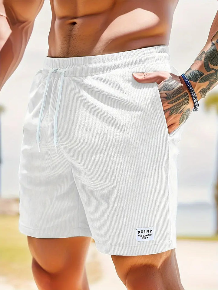 "Men's loose-fit corduroy shorts with drawstring waist in various colors, soft texture, relaxed fit for casual wear."