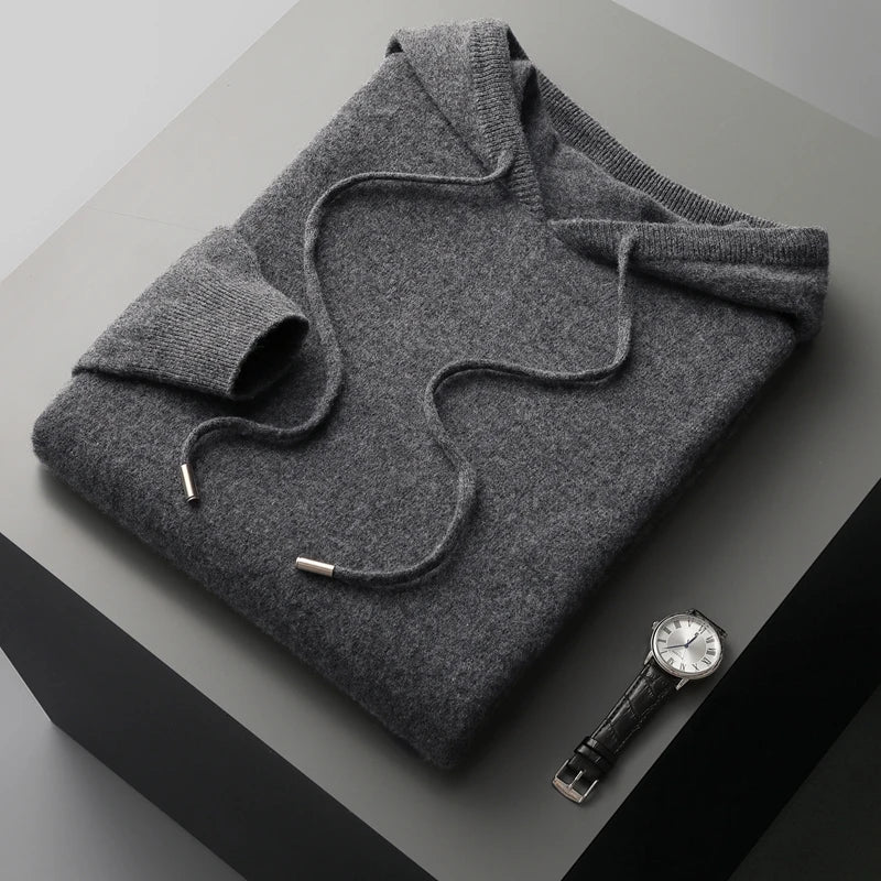 "Men's luxury cashmere hoodie with adjustable hood, slim fit, ribbed cuffs, in versatile colors, soft and breathable."