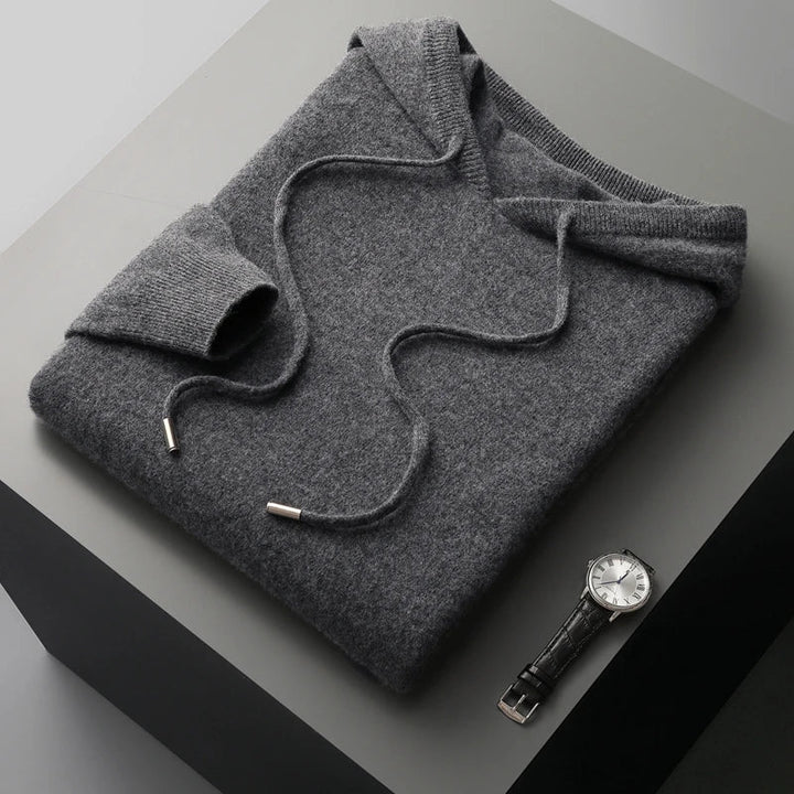 "Men's luxury cashmere hoodie with adjustable hood, slim fit, ribbed cuffs, in versatile colors, soft and breathable."