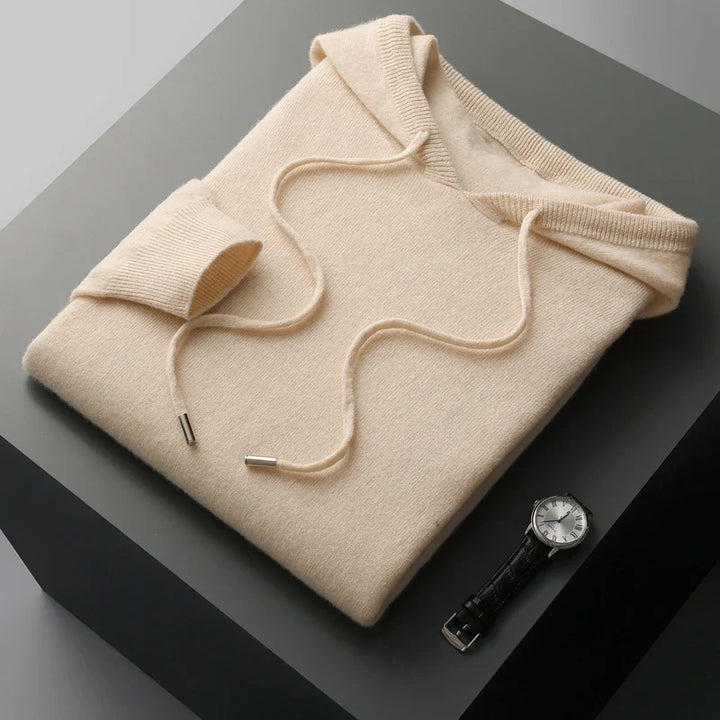 "Men's luxury cashmere hoodie with adjustable hood, slim fit, ribbed cuffs, in versatile colors, soft and breathable."