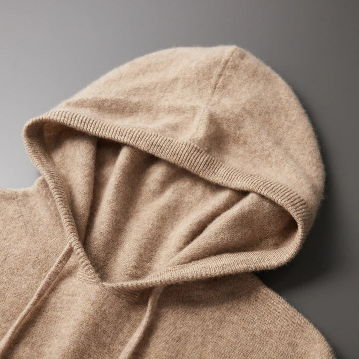 "Men's luxury cashmere hoodie with adjustable hood, slim fit, ribbed cuffs, in versatile colors, soft and breathable."
