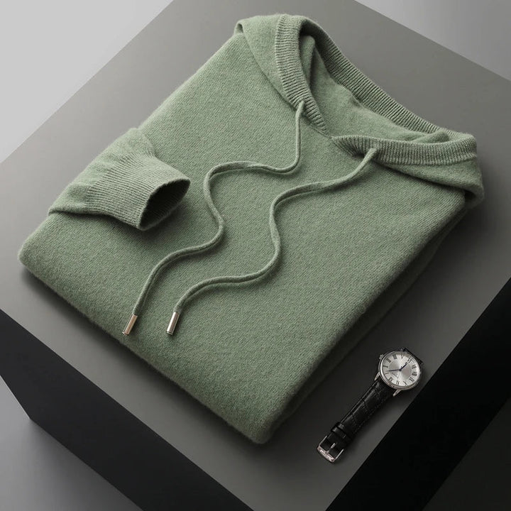 "Men's luxury cashmere hoodie with adjustable hood, slim fit, ribbed cuffs, in versatile colors, soft and breathable."