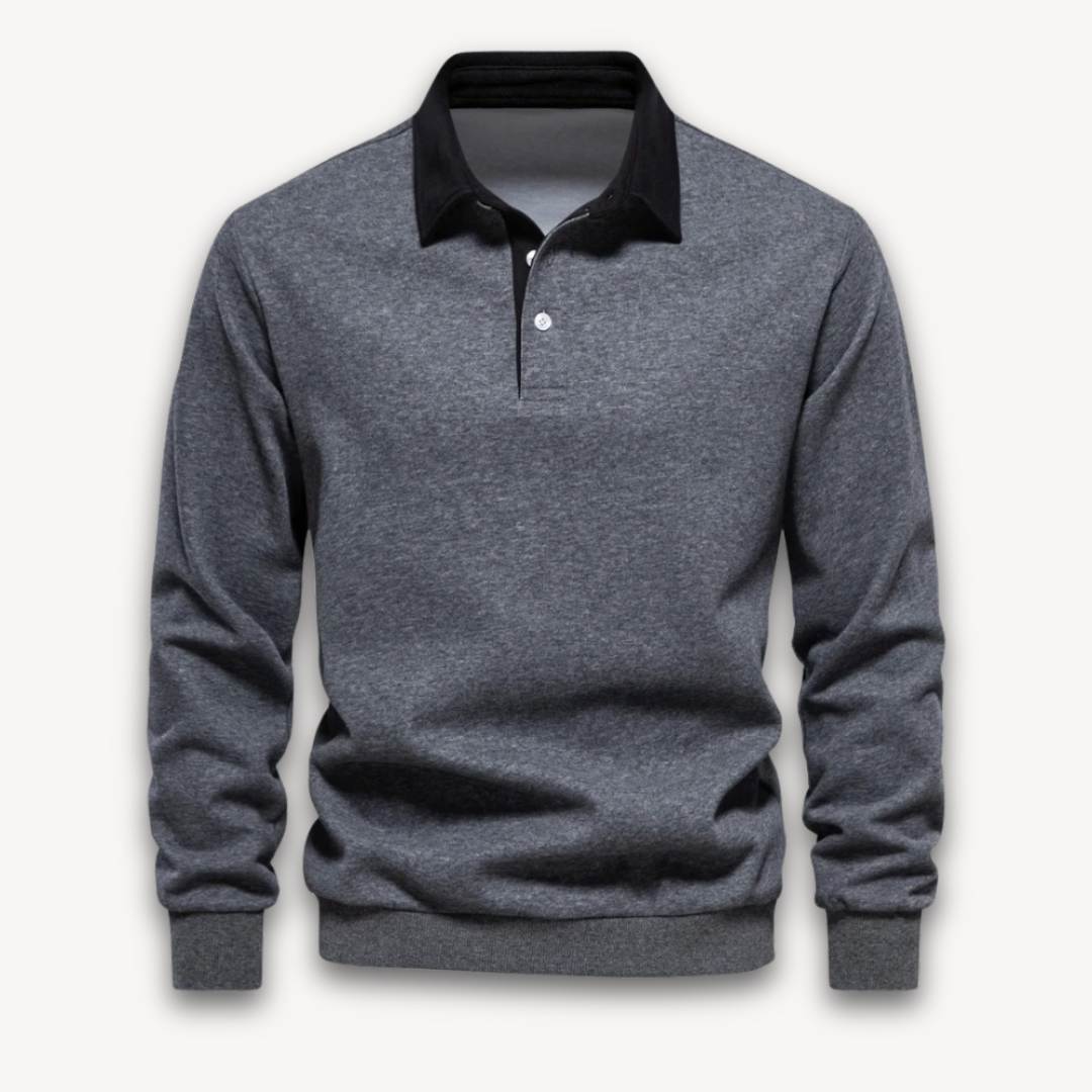 "Men's navy cotton long-sleeve polo sweater with classic design and contrasting collar, perfect for casual or formal wear."