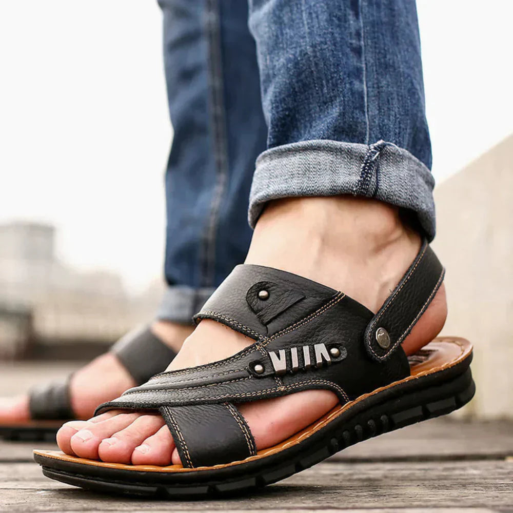Men's open-toe leather sandals with cushioned sole, adjustable straps, and premium finish for casual summer wear.