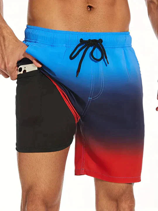 "Men's quick-dry swim shorts with inner compression, bold tropical print, two-tone detail, drawstring waist for secure fit."