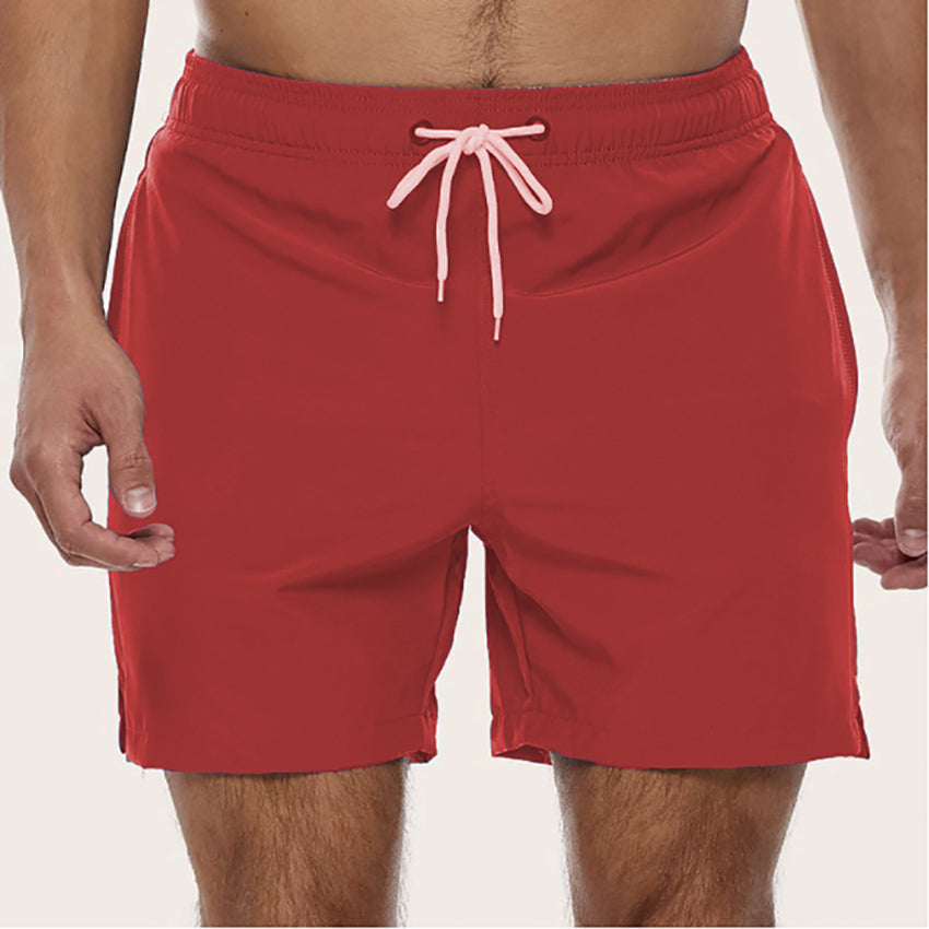"Men's quick-dry swim trunks with trendy design, elastic waistband, colorful patterns, ideal for beach or pool activities."
